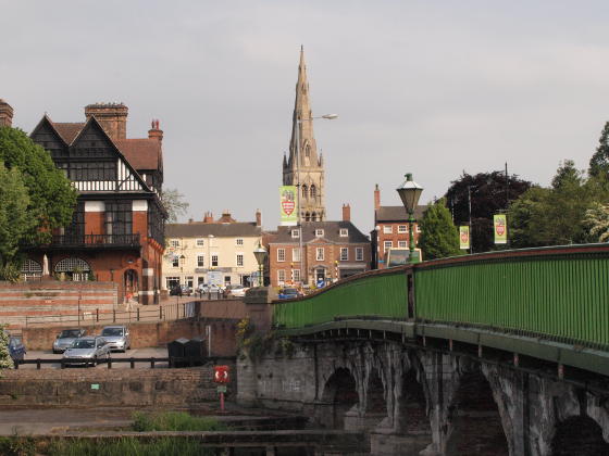 Looking past a bridge towards a town